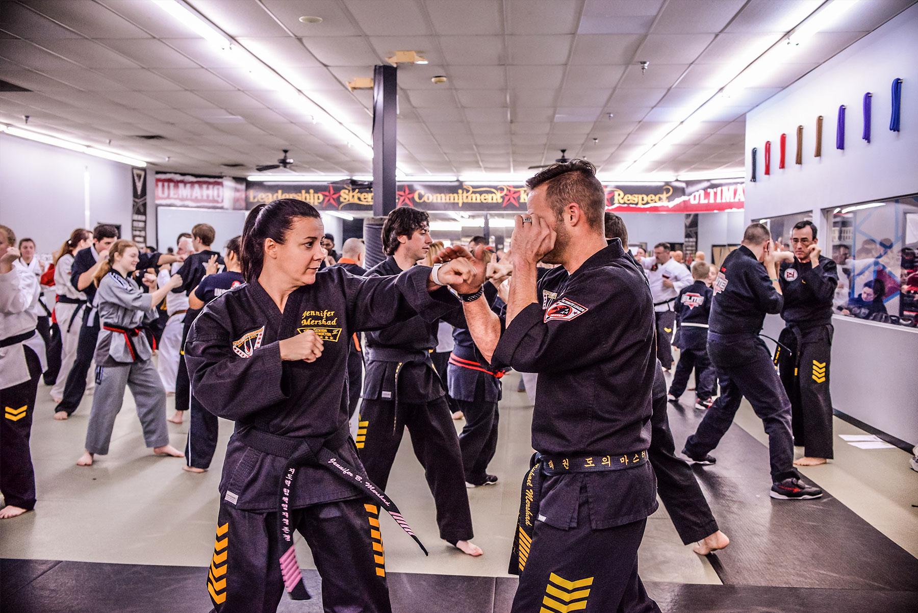 Adults punching in Ultimate Leadership Martial Arts Cincinnati